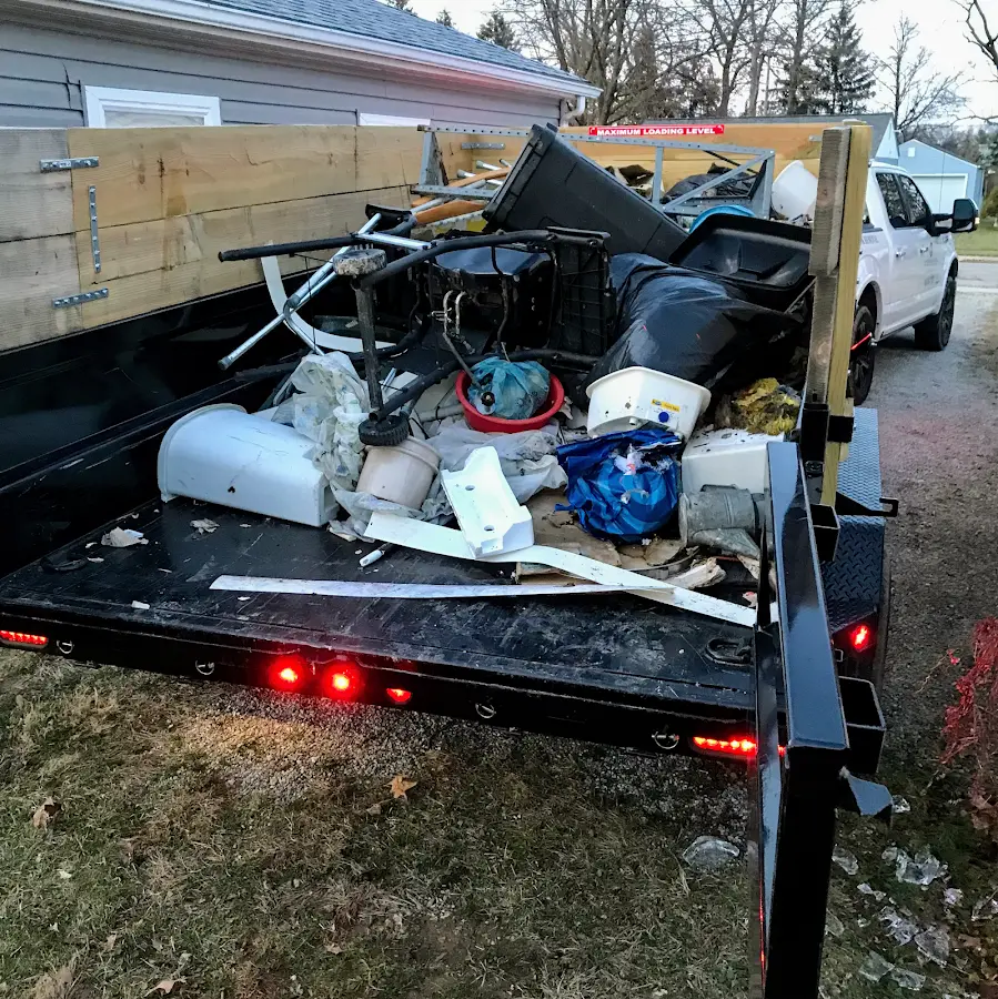 Roll-off dumpster delivered to a residential driveway in Gateway